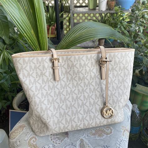 michael kors jet set travel top zip signature monogram tote|Jet Set Travel Small Logo Top.